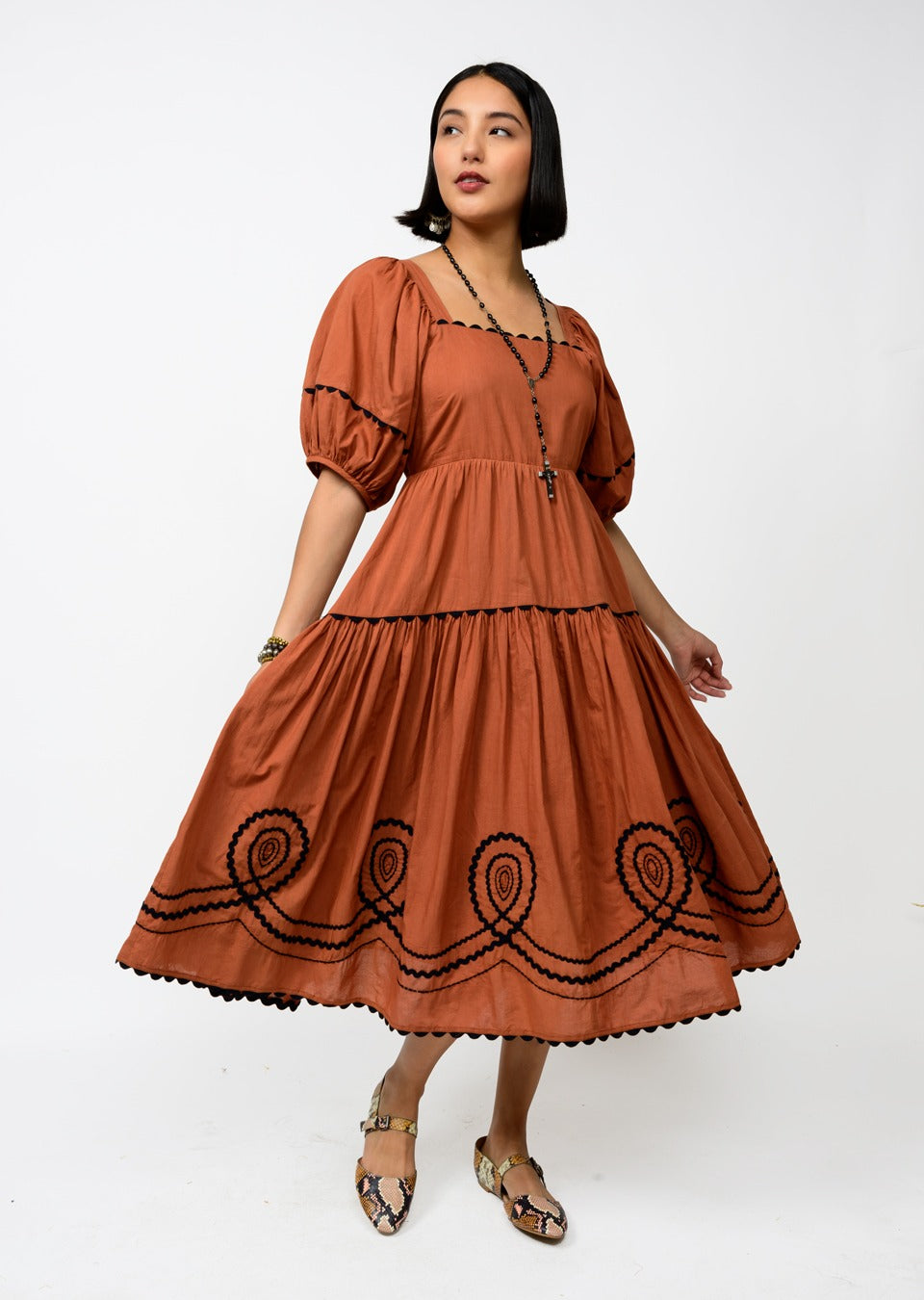 sister mary loopy midi dress in rust