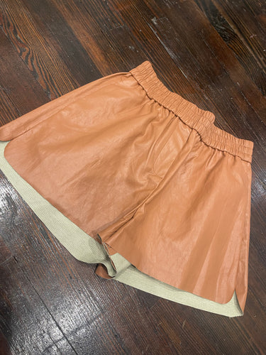 another love china raw hem shorts in saddle