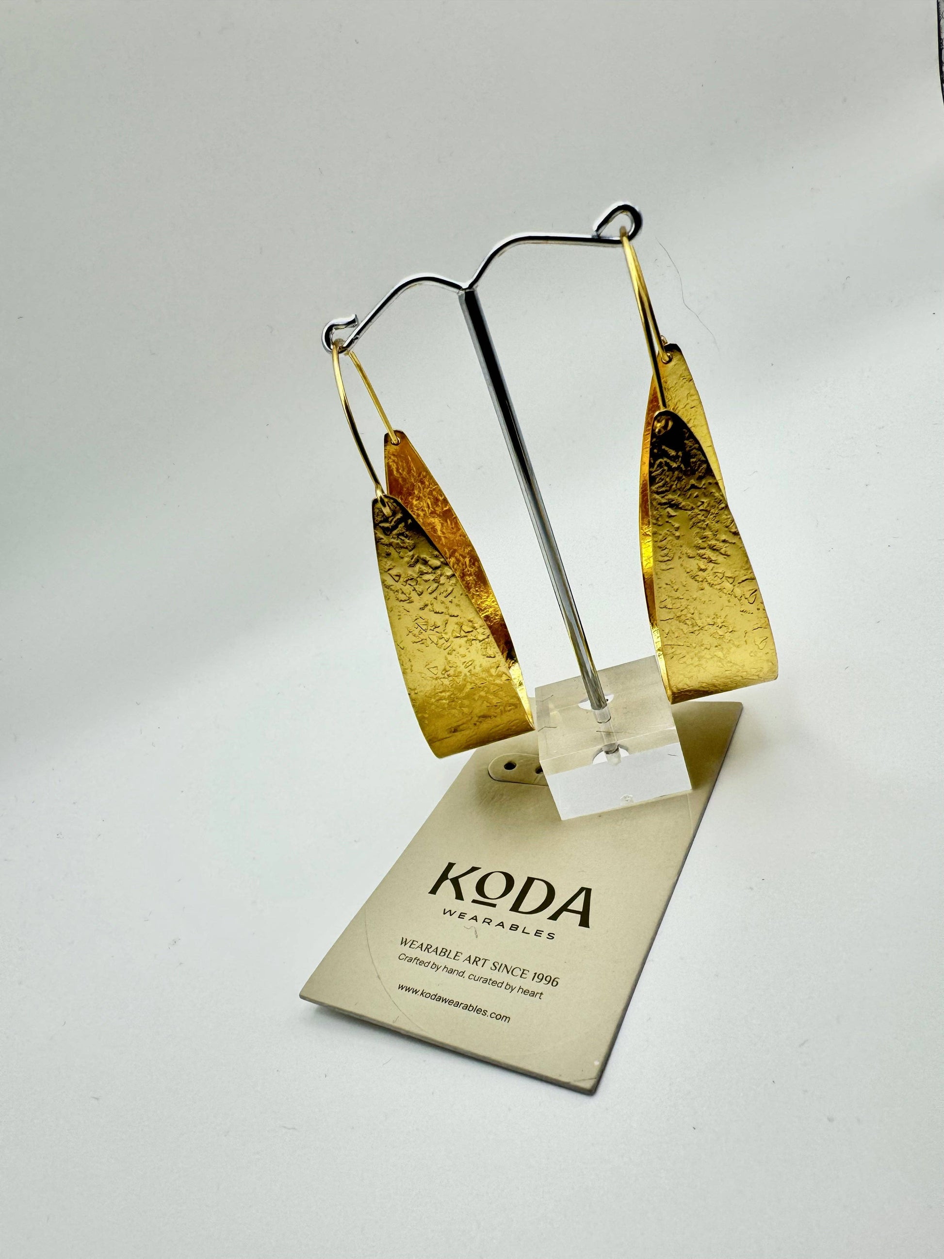 koda nikki earrings in gold