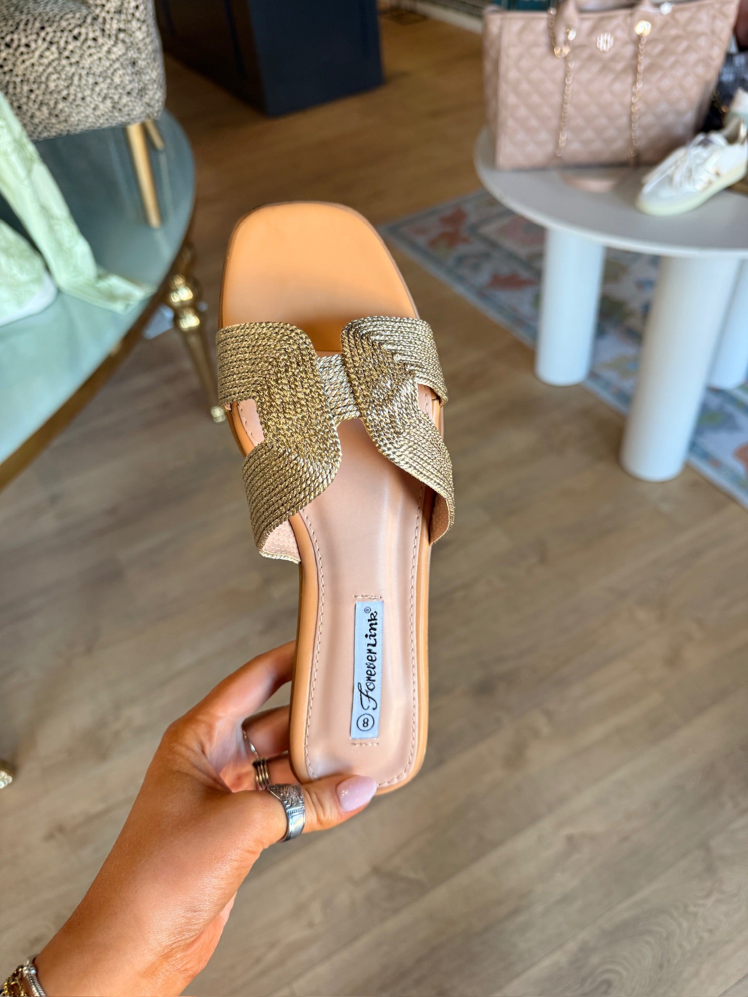 cali woven sandals in gold