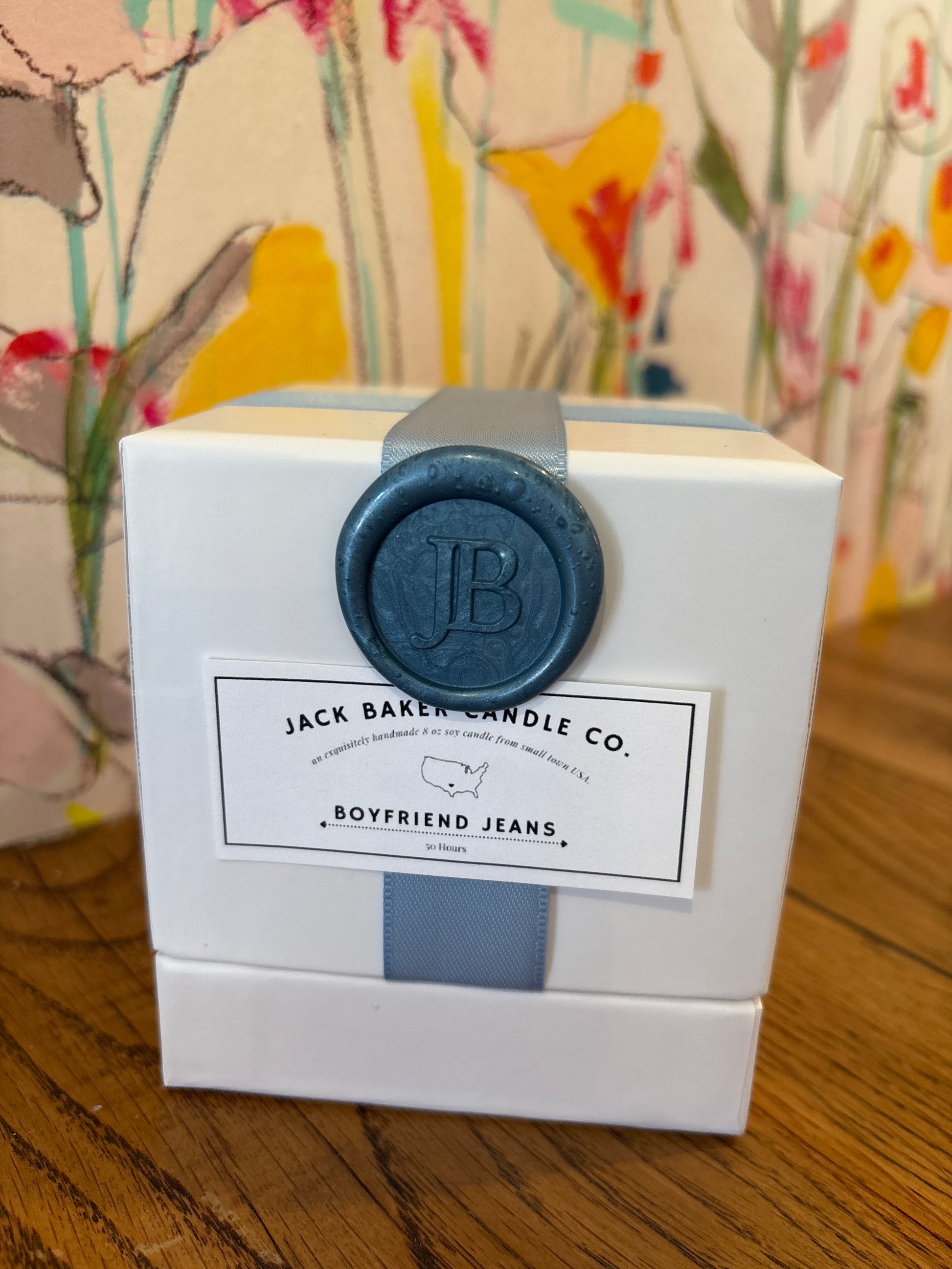 jack baker candle co white box candle in boyfriend jeans