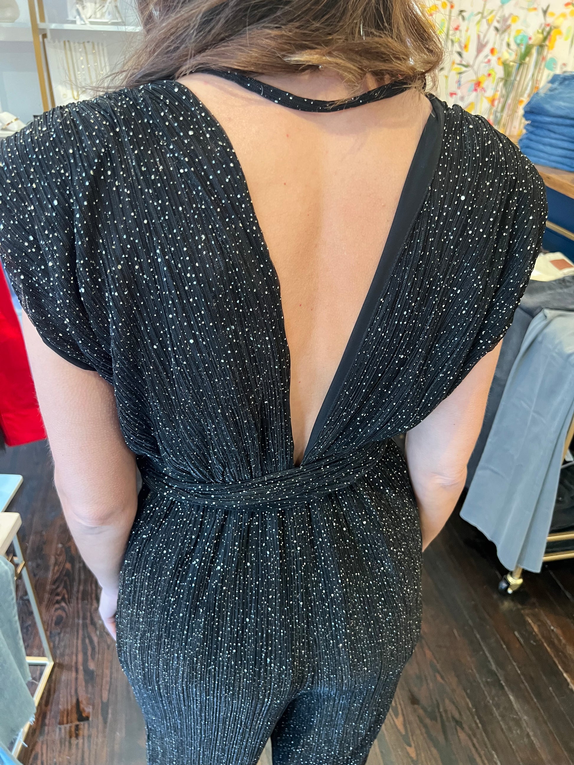 elan festive jumpsuit in black speckle