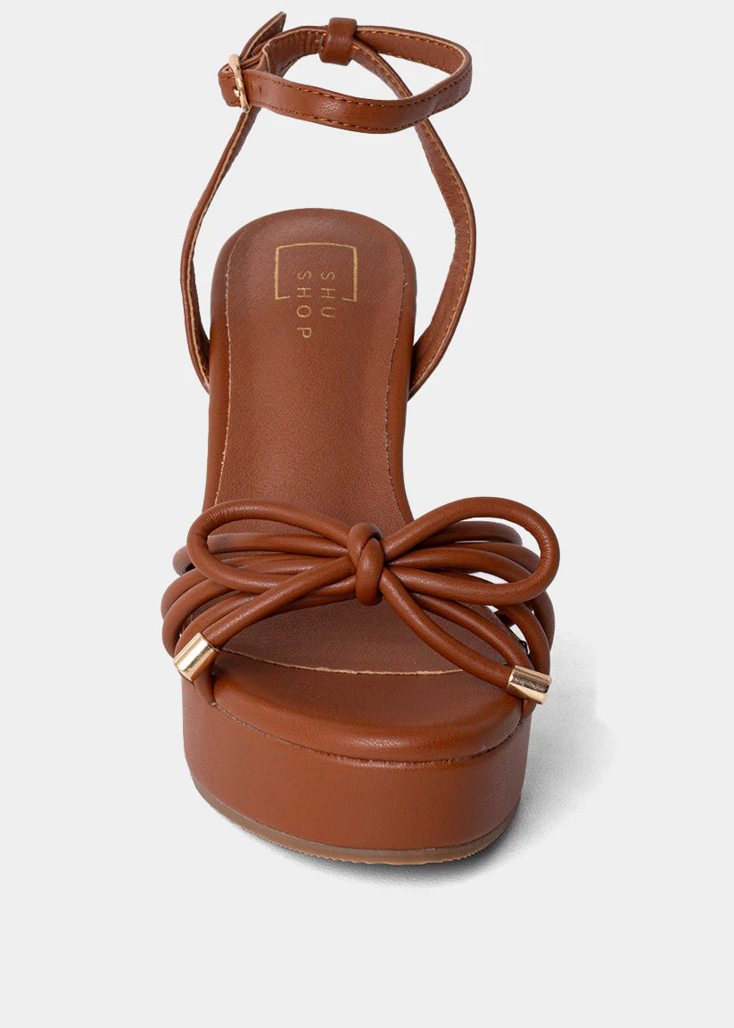 shu shop edith platfrom heel in camel