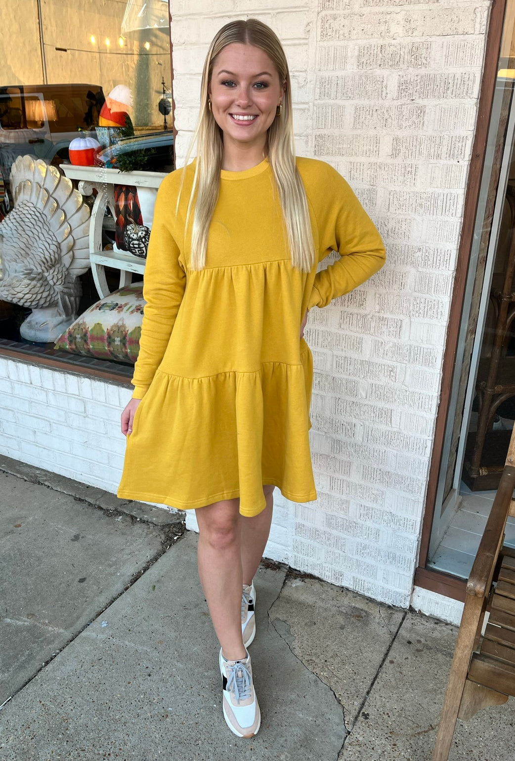 karlie solid long sleeve tier dress in mustard