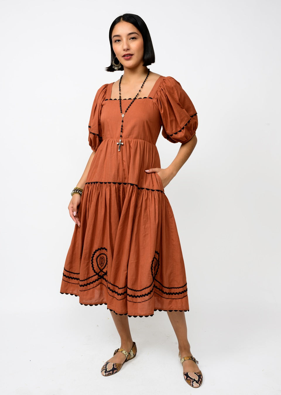 sister mary loopy midi dress in rust