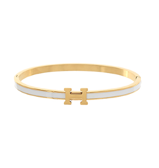 H enamel bangle in gold and white
