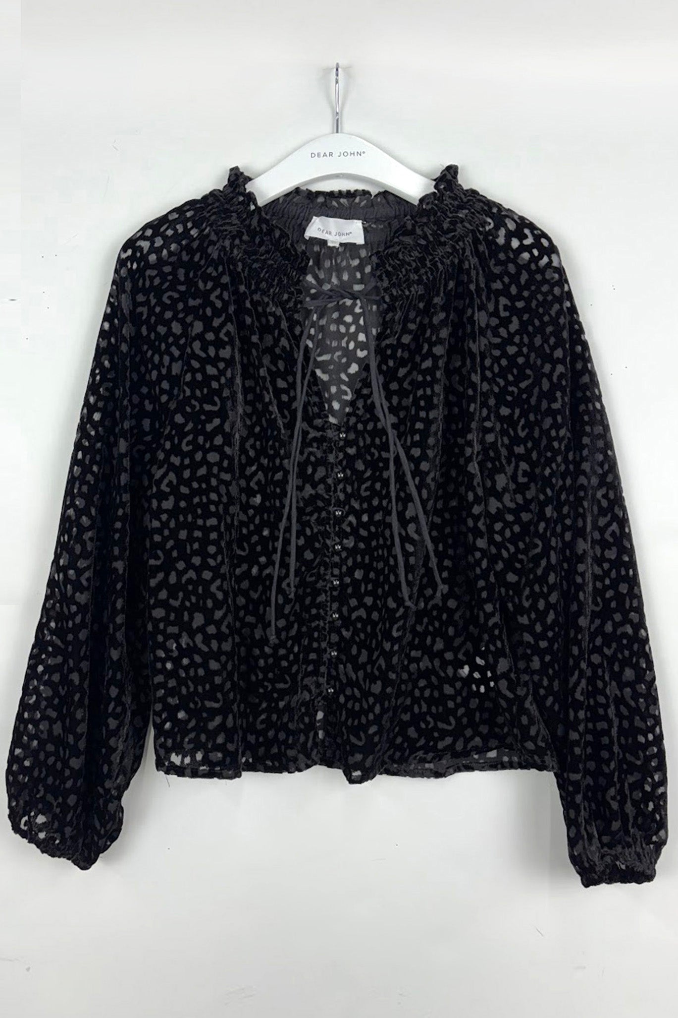 dear john robena top in black leopard