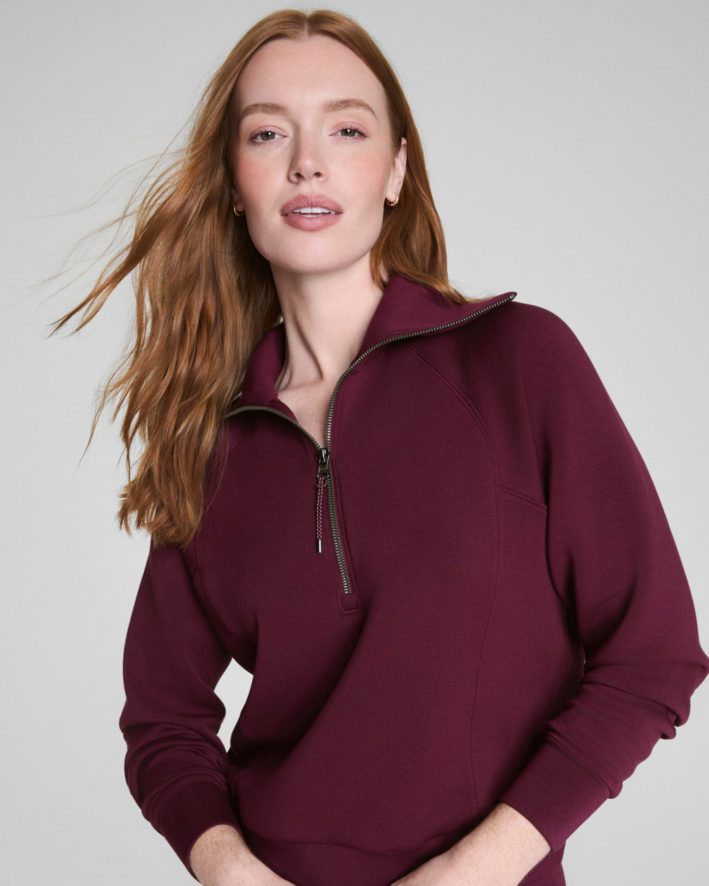 spanx air essentials half zip in plum berry