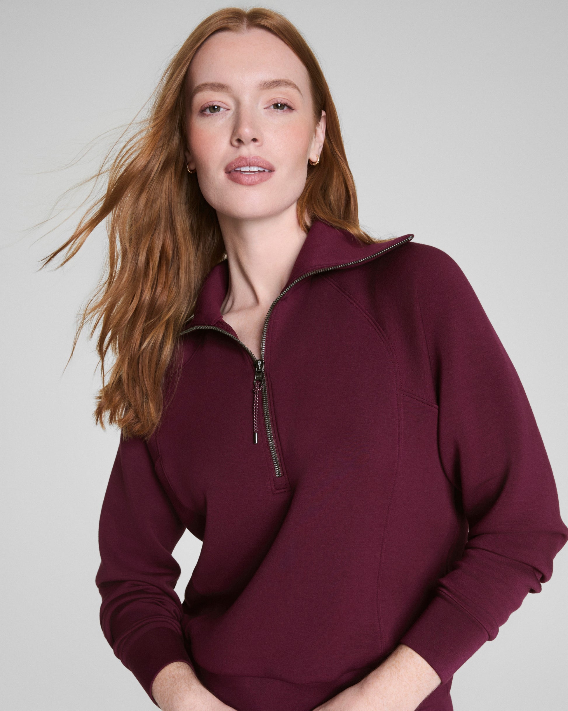 spanx air essentials half zip in plum berry